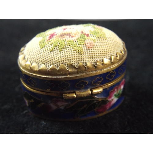 73 - Small metal and enamel Pill box with fabric covered lid