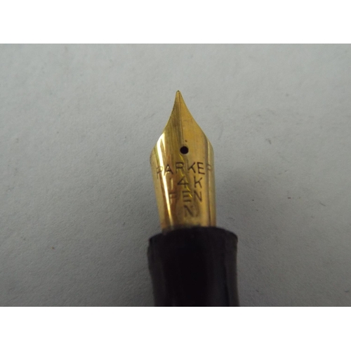 94 - Vintage Parker Fountain pen with 14ct gold Nib, some slight damage to cap.