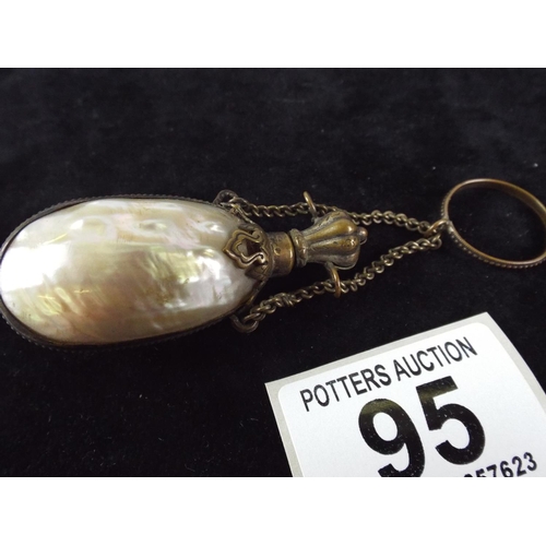 95 - Vintage Mother of pearl and gilt metal scent bottle with corked lid.