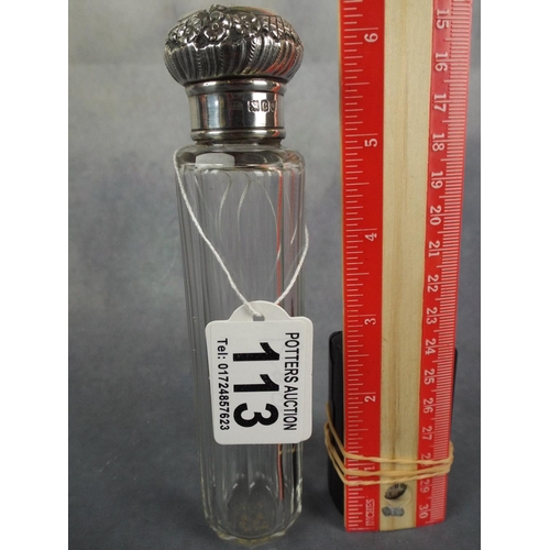 113 - Large Glass & Silver topped Bottle. Scrolled Silver top hallmarked for Birmingham 1898