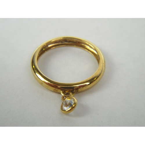 53 - 9ct Gold Band with attached stone 2.1 g   Finger size 'N'