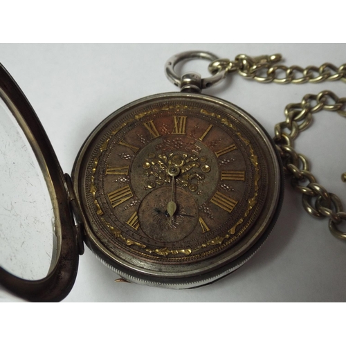 69 - Hallmarked Silver Pocket watch with Champleve Face. Intermittent runner. White metal graduated chain... 