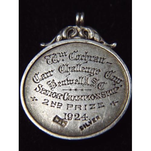 74 - Solid Silver Swimming fob. Dated 1924.