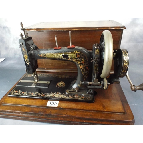 122 - Victorian Bradbury's Family Sewing machine with original wooden box. Serial Number 202500 1890's