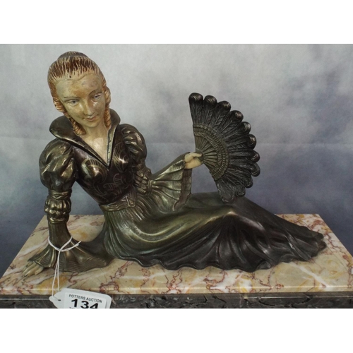 134 - Deco Era spelter figure of a reclining lady on solid marble base