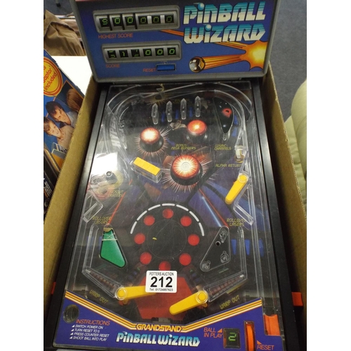 212 - Grandstand pinball wizard electronic pinball game with box.