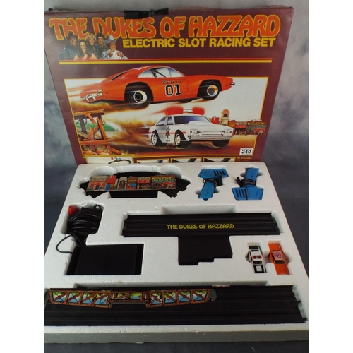 240 - Dukes of Hazard Slot Racing set, Boxed and complete