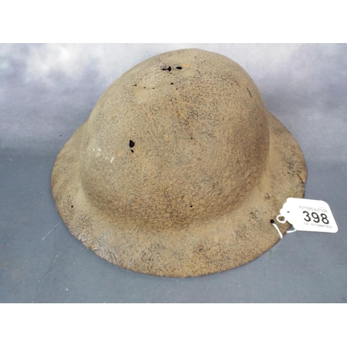 398 - WW1 Field found Brodie helmet.