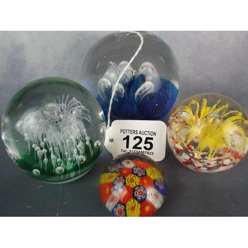 125 - Four Blown Glass paperweights