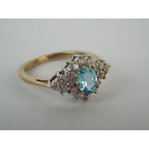 32 - 9ct Gold Aquamarine & Diamond set ring. 2.7 g  Finger Size 'M'