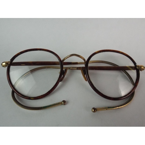 54 - Pair of Vintage Horn rimmed Spectacles with Yellow metal fittings. Original case.