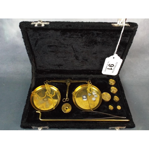 91 - Set of Chemists Scales in original Lidded box complete with weights.