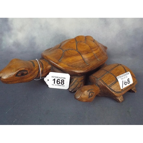 168 - Two carved Turtle figures