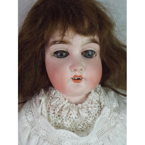 105 - Victorian Era Gebruder Kuhnlenz Doll with Ceramic Head & Kid Leather Limbs.