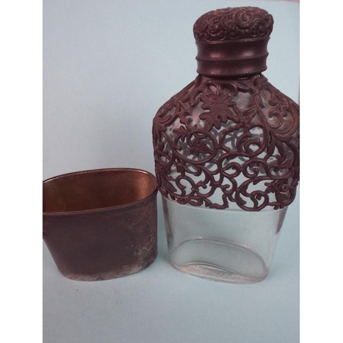 117 - Interesting scrolled Hipflask with detachable drinking cup.