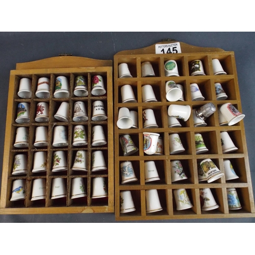 145 - Collection of Porcelain Thimbles with wooden display racks