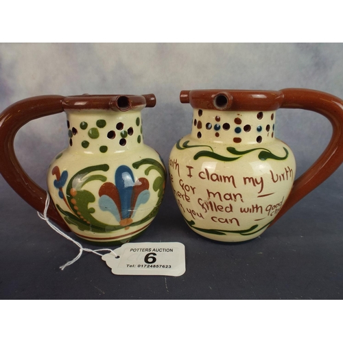 6 - Two Torquay Motto ware puzzle jugs, one a/f to lip