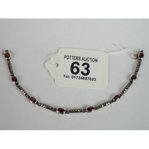 63 - 925 Silver Marcasite, Garnet Set Bracelet.