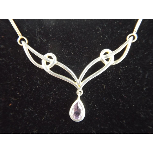 72 - 925 Silver Necklace set with Amethyst coloured stone.