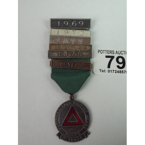 79 - National  Safe Driving Award Medal with five year bars.