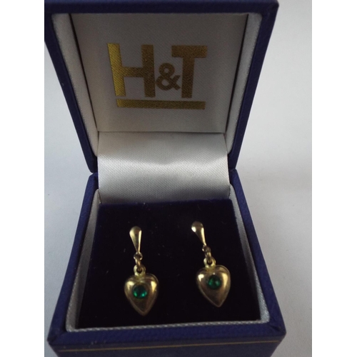 111 - Pair of 9ct Gold emerald Set Earrings.