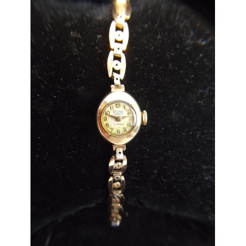 128 - Rone, Incabloc, Ladies 17 jewel swiss watch with 9ct gold case.Rolled gold strap. Rolled gold Strap