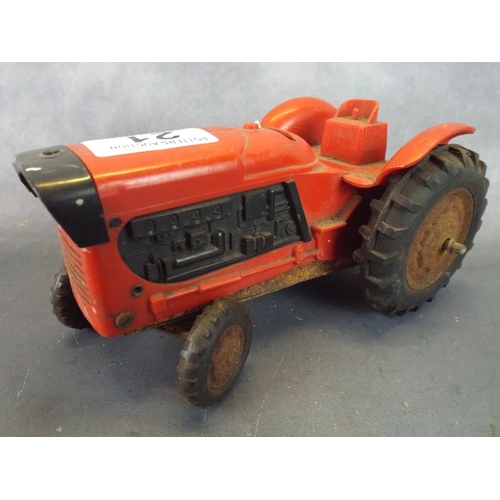 21 - Vintage Marx plastic and tinplate toy tractor, battery operated.