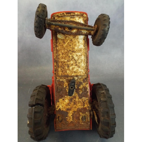 21 - Vintage Marx plastic and tinplate toy tractor, battery operated.