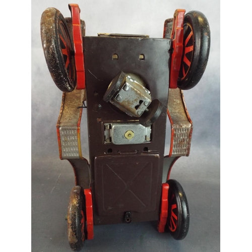 22 - Tinplate Battery operated model of a vintage car, requires attention.