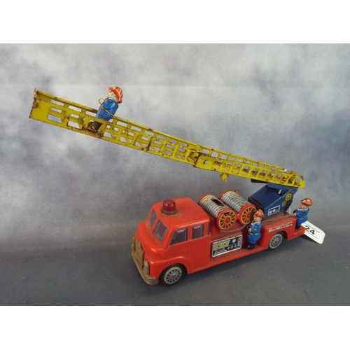 24 - Vintage Plastic & tinplate model of a fire engine.