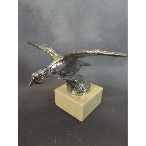 49 - 1930's Vintage Bonnet Mascot as a Flying Pheasant. Mounted on marble base.