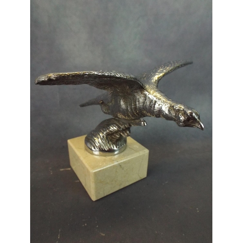 49 - 1930's Vintage Bonnet Mascot as a Flying Pheasant. Mounted on marble base.