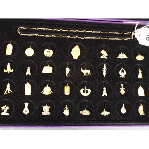 88 - 925 gold plated Silver Chain plus 28 Gold plated Silver Egyptian Pendants in presentation box.