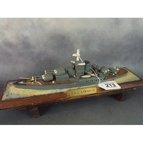 213 - Scratch built wooden model of the HMS Revenge on a wooden plinth. 16 inches long.