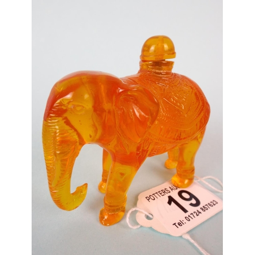 19 - Small amber elephant scent bottle