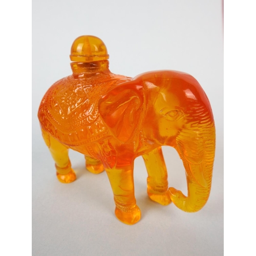 19 - Small amber elephant scent bottle