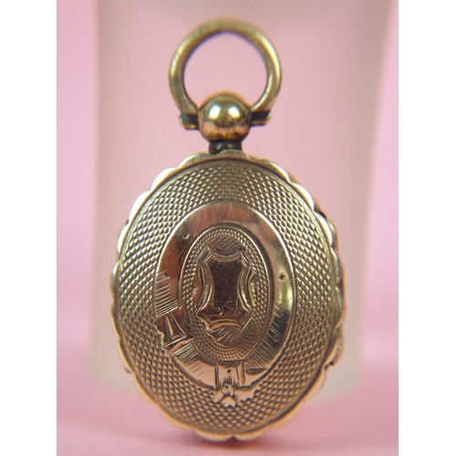 40 - Victorian Era 15ct Gold double ended locket. 9.0g