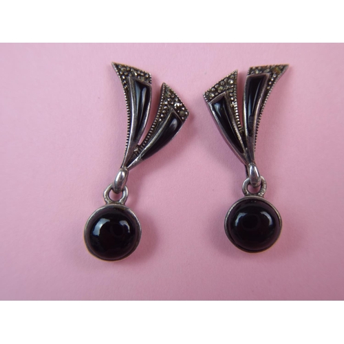 47 - A Pair of 925 Silver marcasite black stone set drop earrings.