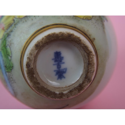 7 - A small oriental porcelain scent bottle with hand painted erotic images