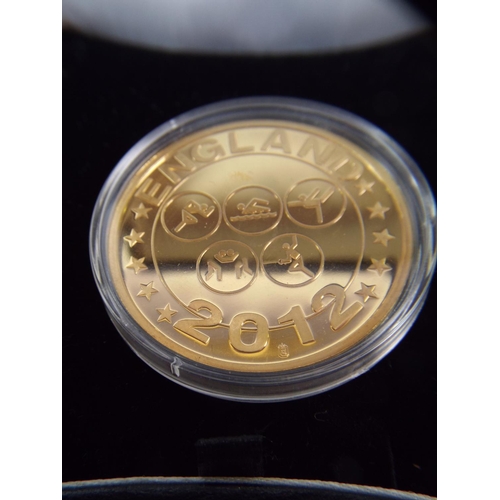 77 - 2012 Olymimpics torch relay coin. Ltd ed 462.