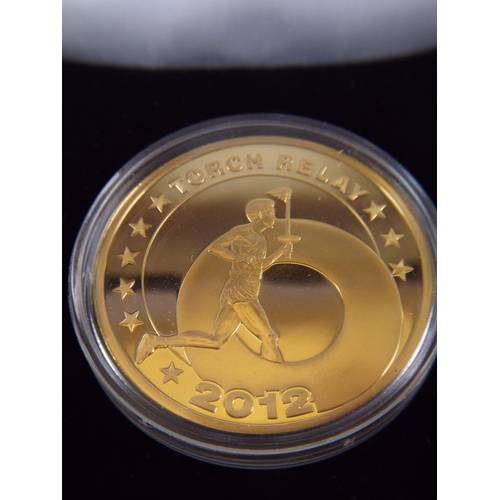 77 - 2012 Olymimpics torch relay coin. Ltd ed 462.