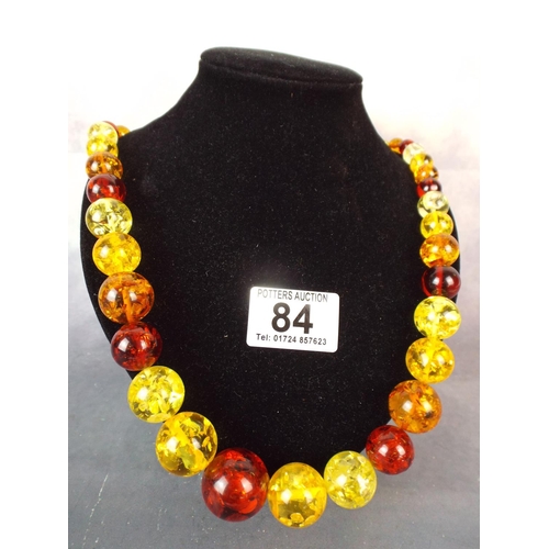 84 - 22 Inch chain of graduated amber type .