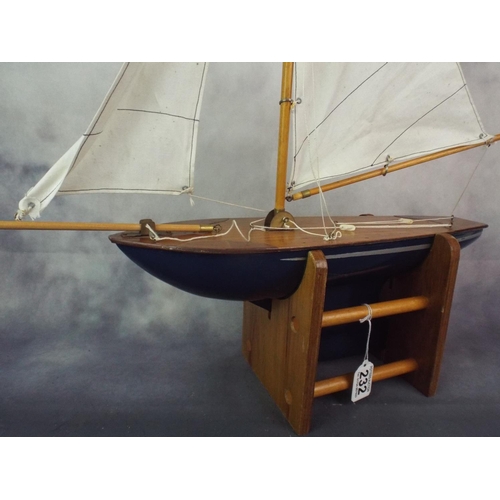 232 - 1950's 'Star' pond yatch with purpose built wooden cradle stand.