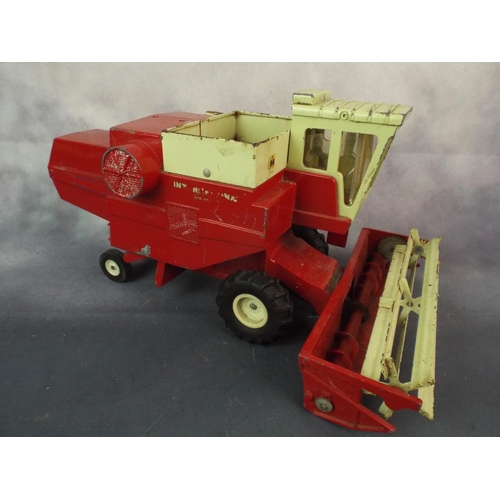 234 - Large metal model of a harvester by ERTL company, USA