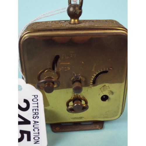 245 - Small German made travelling alarm clock in working order.