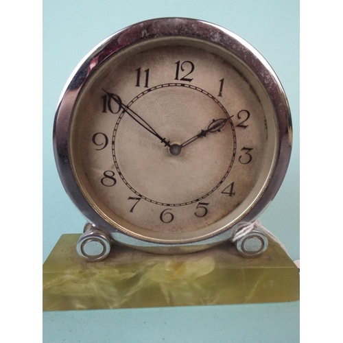 246 - Small art deco centre wind alarm clock on marble base. Working order