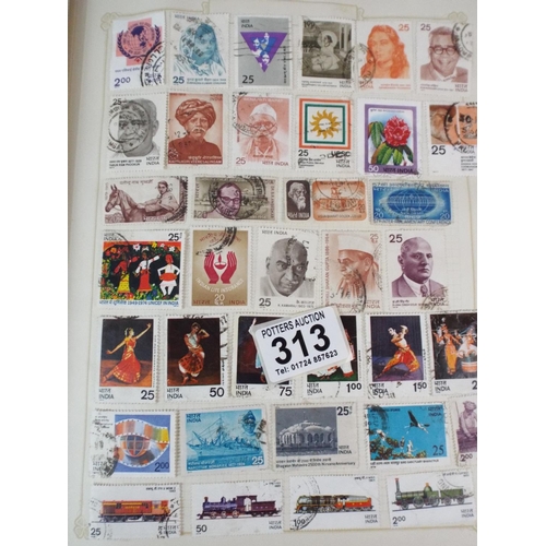 313 - Album of world stamps plus album of first day covers.