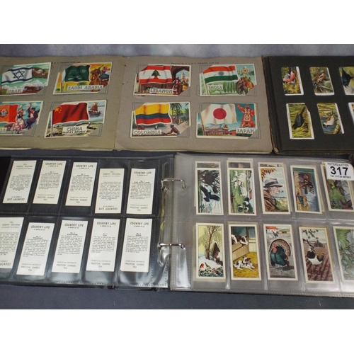 317 - Various postcard and cig card albums.