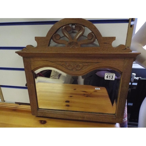 413 - Carved oak dressing table mirror with bevelled glass, used now as hanging mirror.