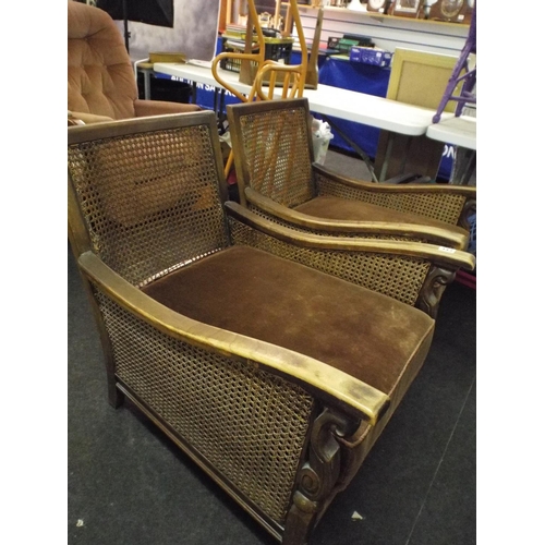 443 - Pair of 1920's era heavily built upholstered Summerhouse chairs.